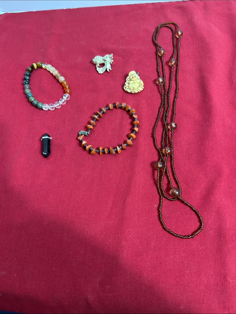Red chip bracelet, necklace, black crystal, and 1 pendant and a fish brooch